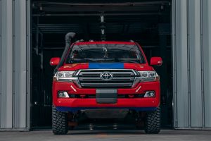 Red Toyota Hilux off road truck